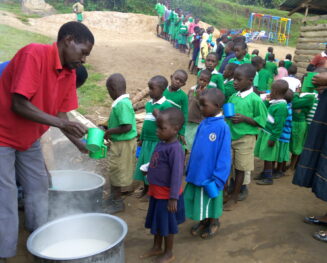 giving food to needy children and orphans