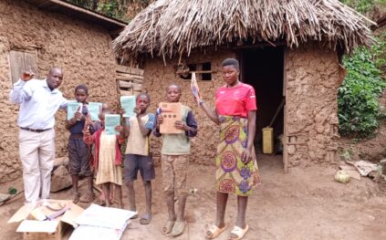 Children receiving school supplies